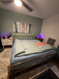 Beautiful modern king-size gold metal platform bed with matching 12-inch Zinus memory foam mattress included
