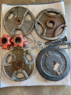 (4) standard 25Lb plates with accessories