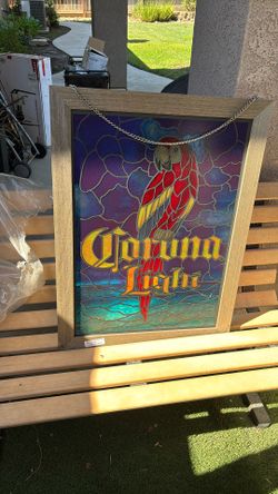 Amazing vintage piece. It’s probably 30 years old Corona beer large Stained Glass Bar Sign with parrott hanging 32”  Large quality piece. Beautiful co