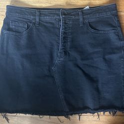 Old Navy black denim skirt with frayed hem. Size: 14