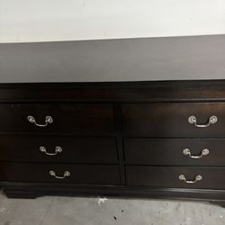 Six-drawer dark wood dresser 