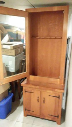 Gun and rifle cabinet cider wood all around it beautiful