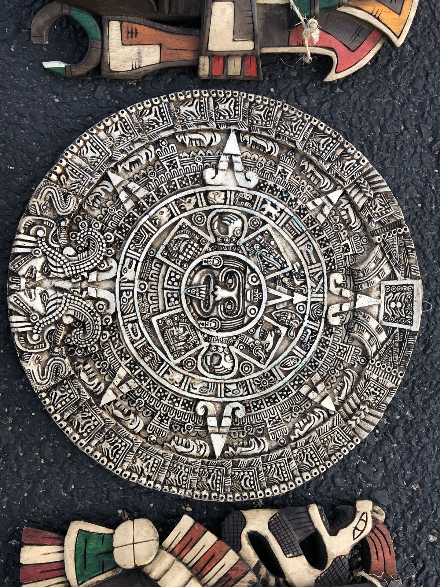 Mayan Calendar and 2 mayan wooden mask