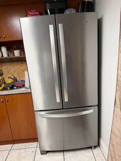 Double door refrigerator with bottom freezer