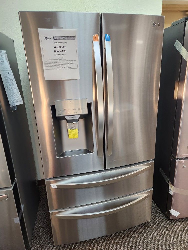 Never Used 28 Cu.ft French Door Refrigerator With Water And ICE
