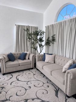 Beige Sofa and Loveseat Set WONT LAST