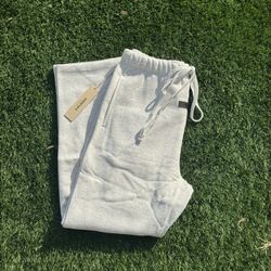 ESSENTIALS SWEATPANTS Light Oatmeal