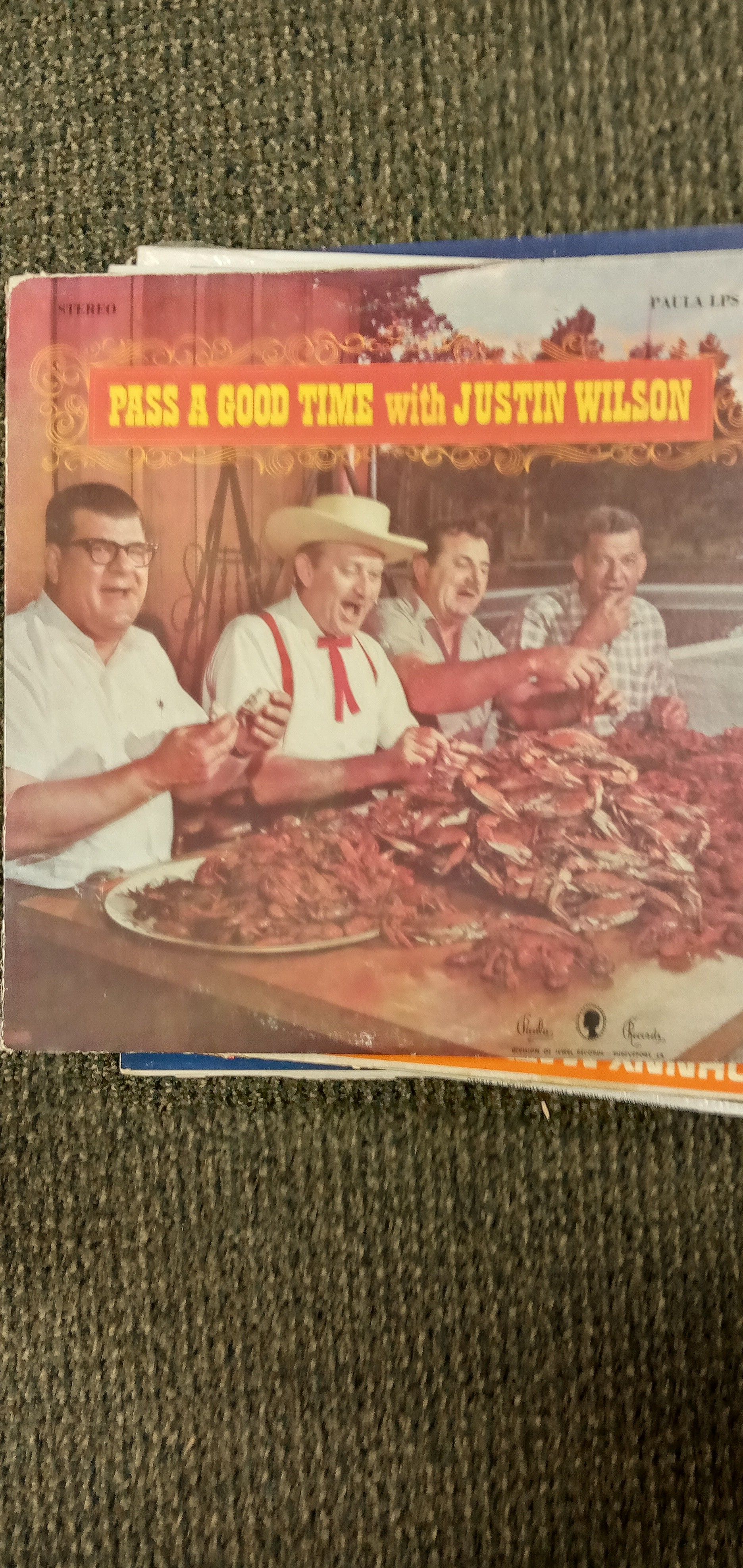 Pass a good time with Justin Wilson vinyl record