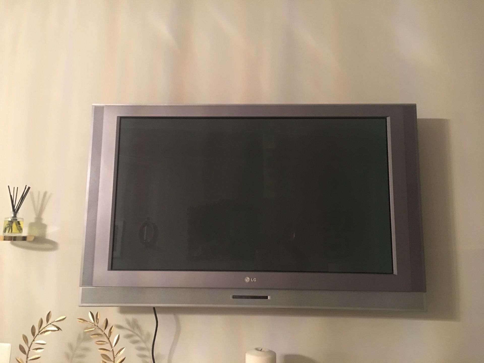 LG flat screen TV with remotes 44.5 x 27 inches