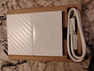 The Western Digital (WD) My Passport 1TB white portable external hard drive