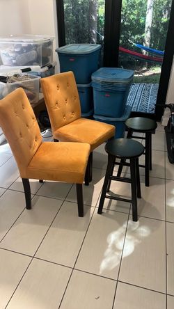 Orange chairs with black stool combo
