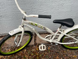 Girls Cruiser Bike with Daisy Graphics, tire size is 24x1.54-507)