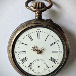 Gorgeous .800 Silver marked pocket watch. 6 Rubis. Lovely design on back of case. Interesting inscription dated 1883. Movement looks clean. Not workin