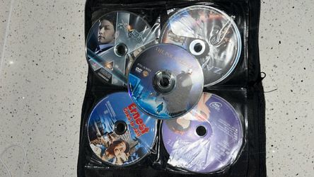 Alot of DVD’s (movies and games) with Black Zip Carry Case