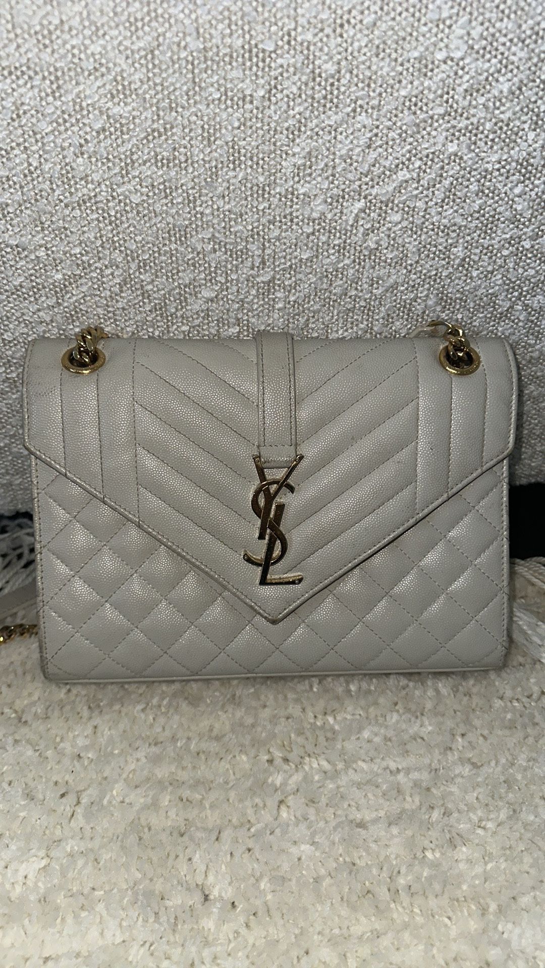 Saint Laurent medium envelope bag in quilted grain de poudre embossed leather