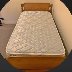 Twin mattress, box spring, and bed frame with memory foam mattress topper