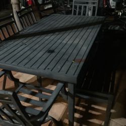 Table Chairs And A Bench