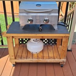 Stainless steel BBG grill with stand and propane tank