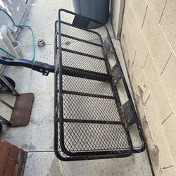 Trailer hitch cargo carrier