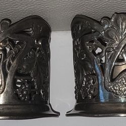 TWO ANTIQUE ART NOVEAU BOTTLE HOLDER