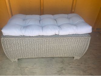 Wicker outdoor bench with cushion