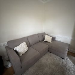 Gray Living Spaces Couch 