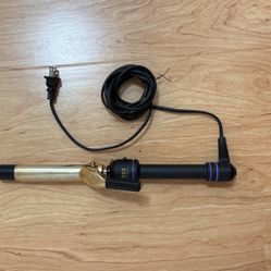 Hot Tools professionals curling iron in gold.
