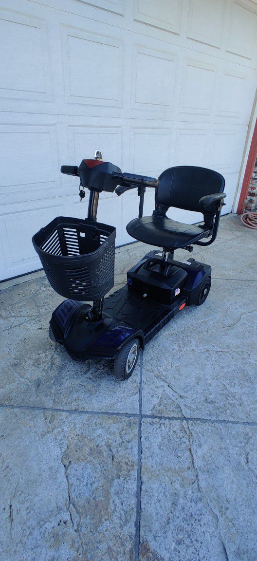 Heavy duty scooter, big batteries, charger 