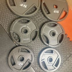 BRAND NEW Full Olympic  Weights Set of Plates: 45s, 35s, 25s, 10s, 5s and 2.5 pounders . Brute: 245 #