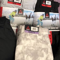 WOMENS AND MENS SNOW PANTS JACKETS OVERALLS SKI SUITS AND BOOTS 