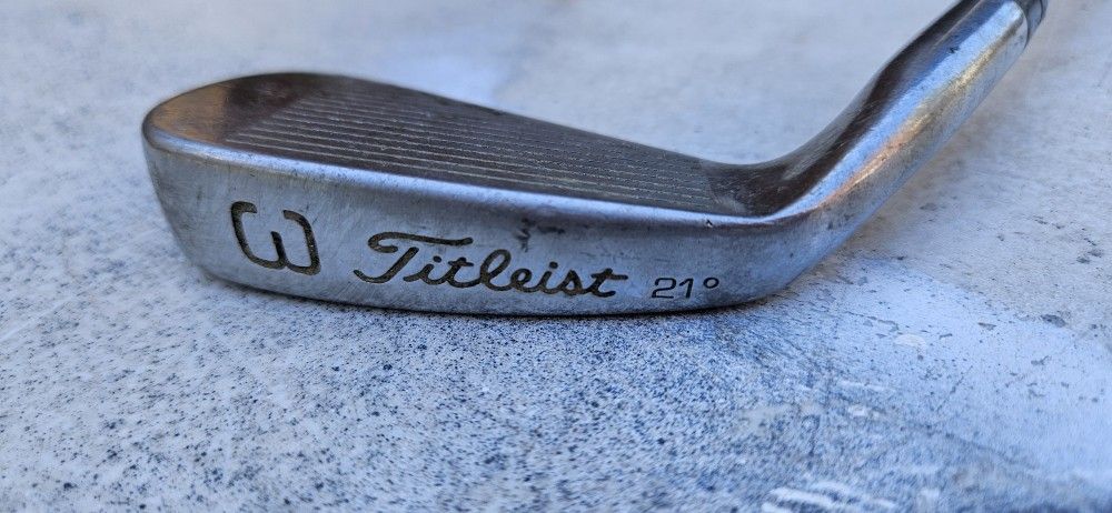 Titleist DCI Black Triangle 3-Iron or a similar model from the Titleist DCI iron line, specifically a 21-degree iron