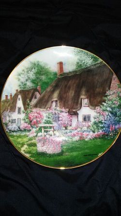 Wishing well cottage plare