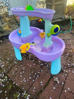 The price is firm.. children's waterfall water table