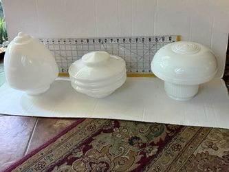 This set of three vintage white milk glass light fixtures/shades