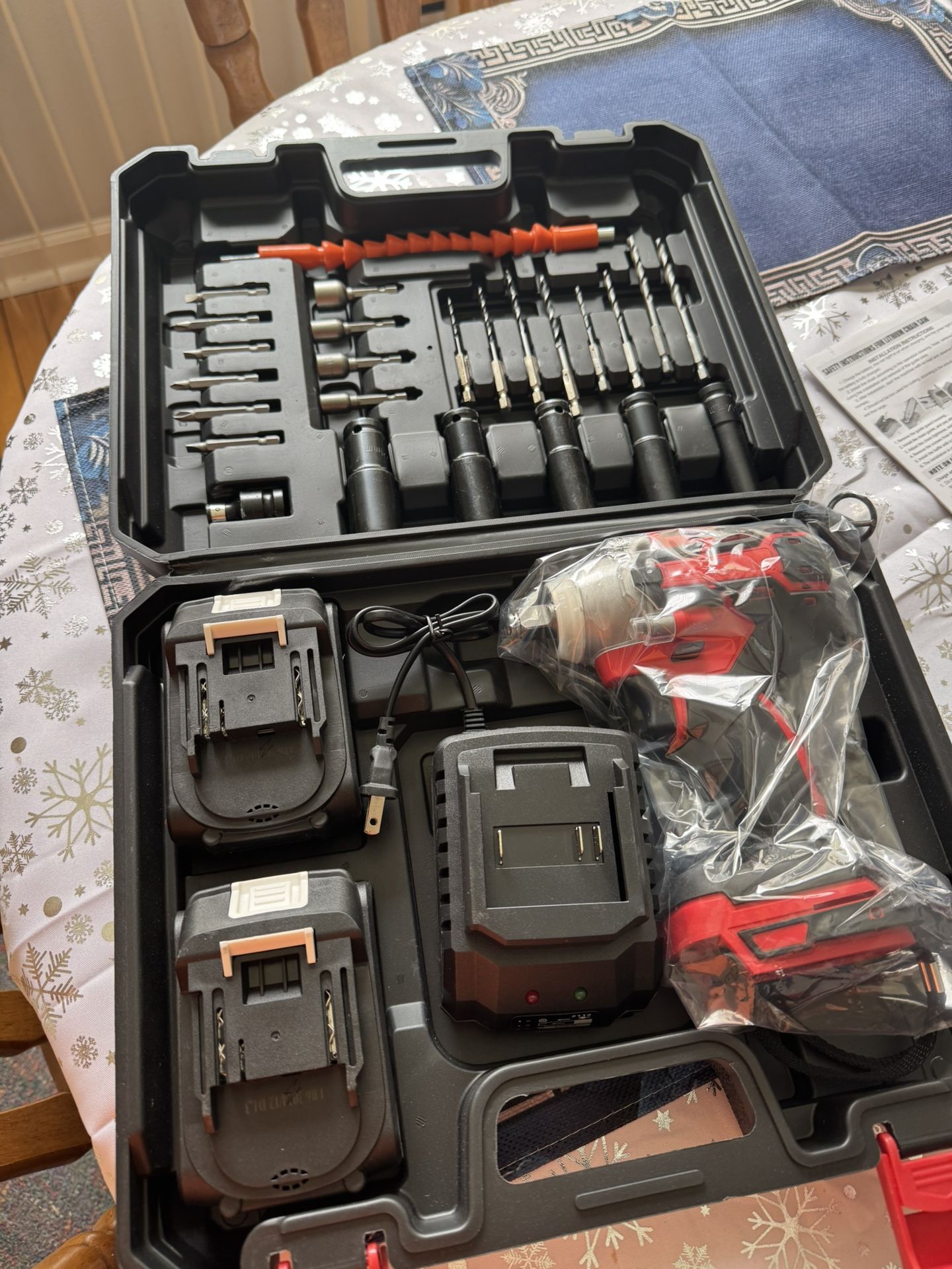 Impact Wrench 1/2” New with 2 batteries &charger with extra 25 pieces sockets& bits