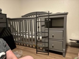 Grey crib