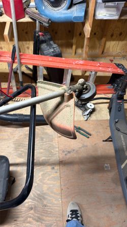 Trimmer head and edger attachment