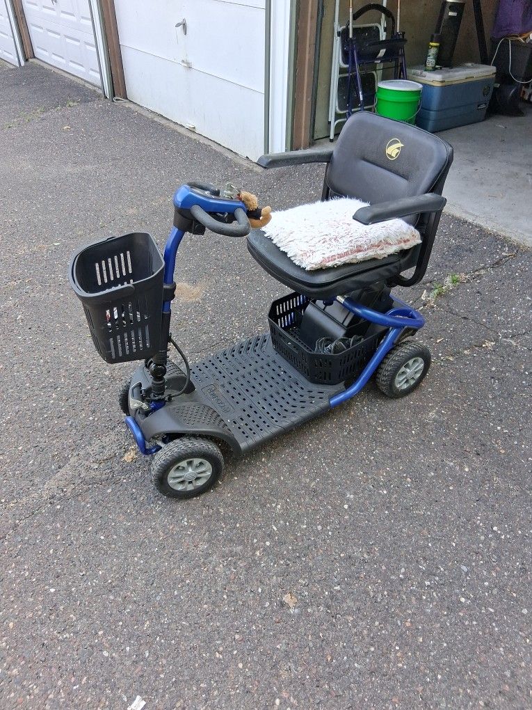 Electric four wheel scooter.