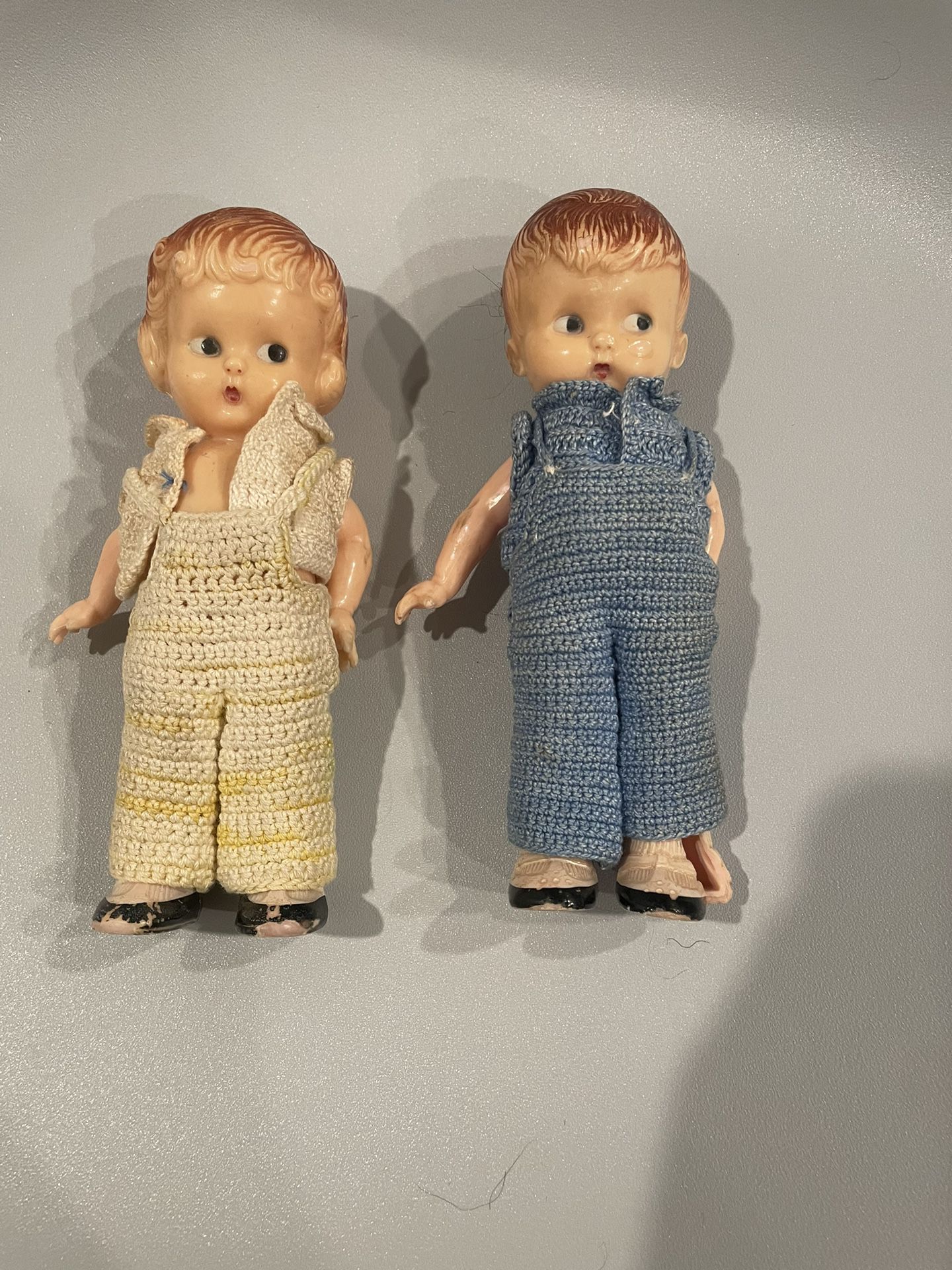 2 Vintage Knickerbocker celluloid dolls: boy and girl w/ crochet clothes