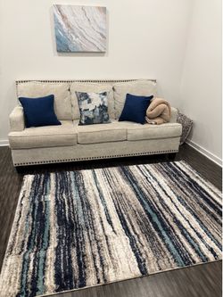 Light beige nailhead couch