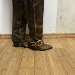 Steve Madden brown boots with large buckle 