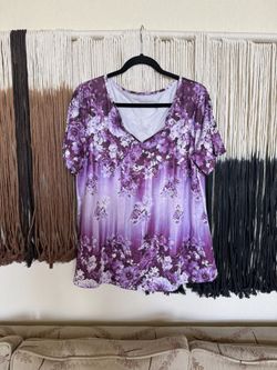 Purple floral graphic print short sleeve V-neck blouse; perfect condition, brand new without tags, never worn!