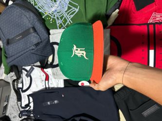 Essentials x new era