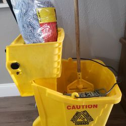 Rubbermaid Commercial Mop Bucket With Ringer And Wheels, Mop, And Two Additional New Mop Heads