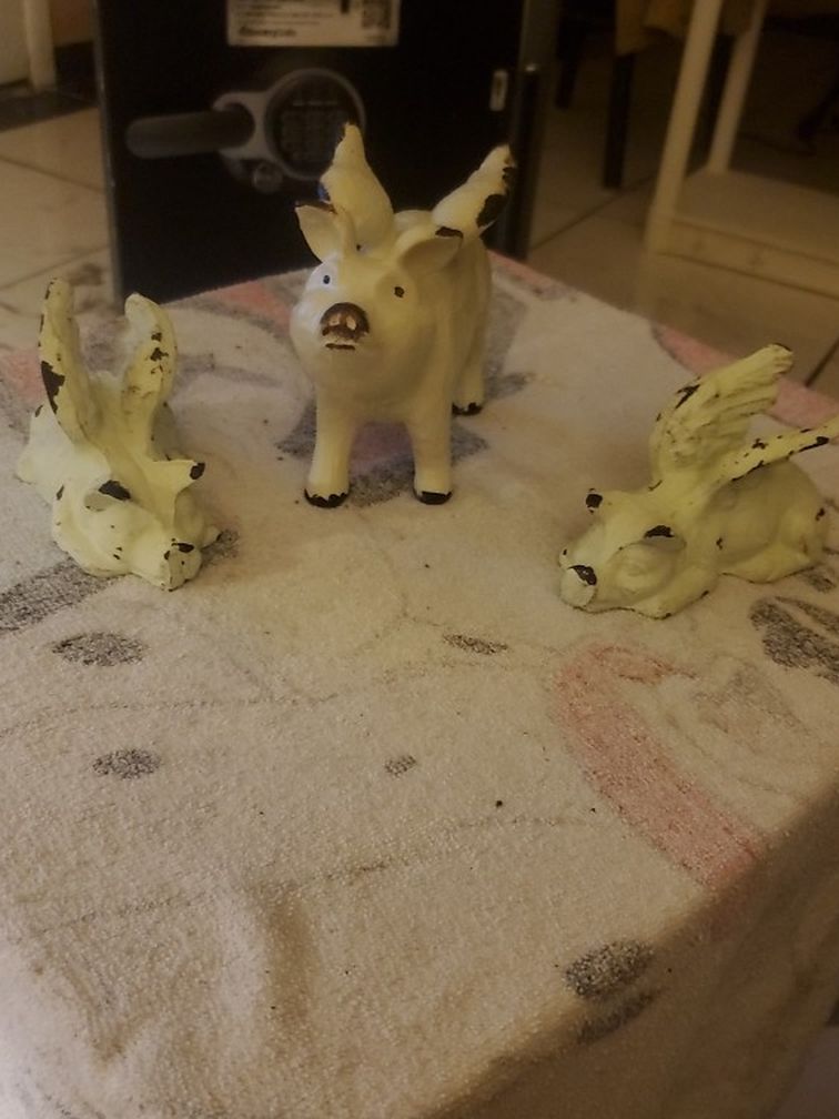 3- Vintage Cast Iron Pigs With Wings