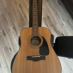Fender DG-10 12-string acoustic guitar with pickup and case