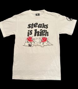 NEW Flip The Bird Entertainment Men’s White T-Shirt with “Steaks is High” on It (Sz Small)