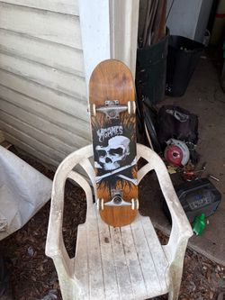 X Games Complete Skateboard Skull Graphic