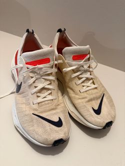 Nike ZoomX Invincible Run Flyknit 3 in the "White Bright Crimson/Oatmeal" colorway (Style
