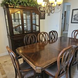 China Cabinet plus table with 8 chairs